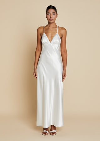 Front view of bride wearing satin bias cut maxi dress