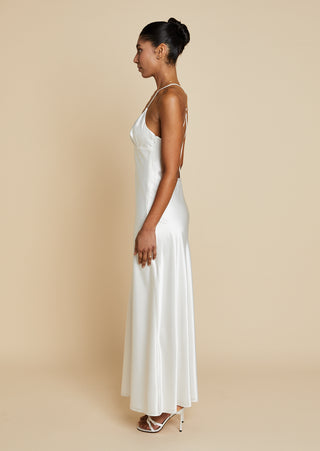 Side view of bride wearing satin bias cut maxi dress