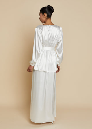 Back view of bride wearing satin robe top with satin maxi skirt
